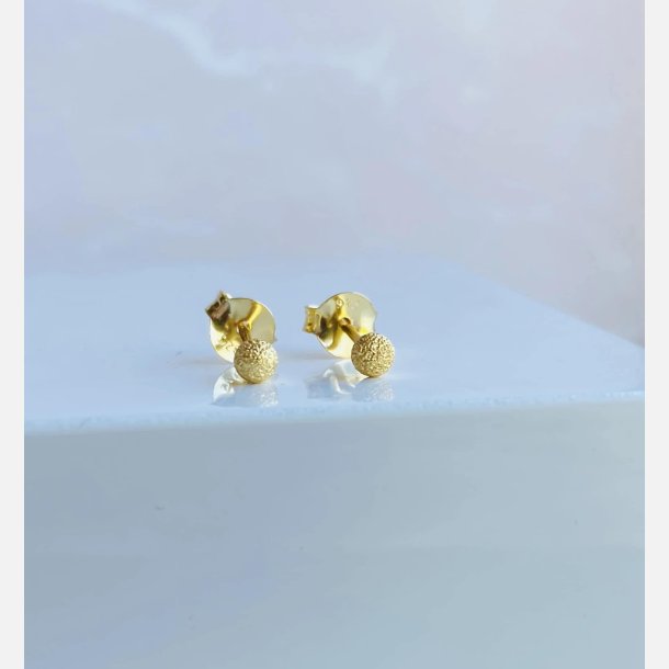 Sm runde restikker med brstet overflade (Forgyldte) UDEN SMYKKESKE