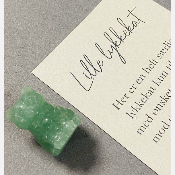 Lille lykkekat (Aventurin) vlg mellem 2 tekster