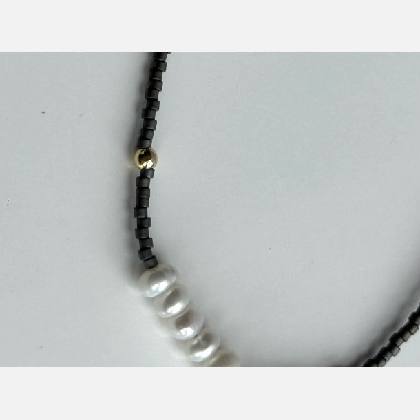Justerbart armb�nd med perler (Gr�) UDEN smykke�ske