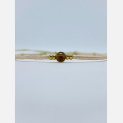 Lily armbnd (creme miyukiperler og lille tigerje sten)